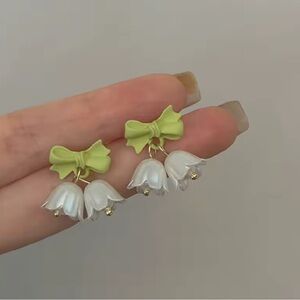Floral Bow Earrings with Green and White Accents
